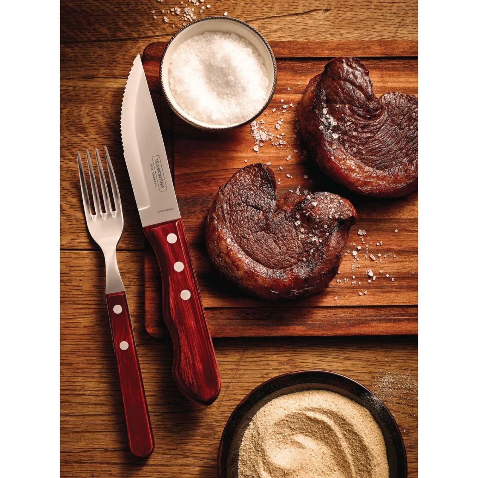 Juego de Cubiertos para Asado Jumbo Tramontina de Acero Inoxidable con Mango Rojo Polywood, 12 piezas.