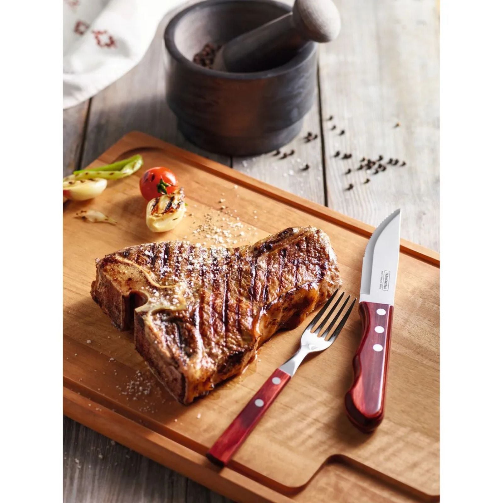 Juego de Cubiertos para Asado Jumbo Tramontina de Acero Inoxidable con Mango Rojo Polywood, 12 piezas.