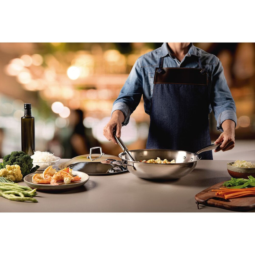 Wok Tramontina Grano de acero inoxidable cuerpo triple con tapa mango 32 cm 5,2 L