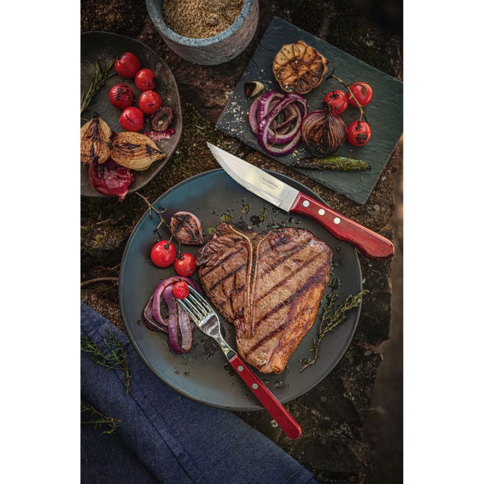 Juego de Cubiertos para Asado Jumbo Tramontina de Acero Inoxidable con Mango Rojo Polywood, 12 piezas.