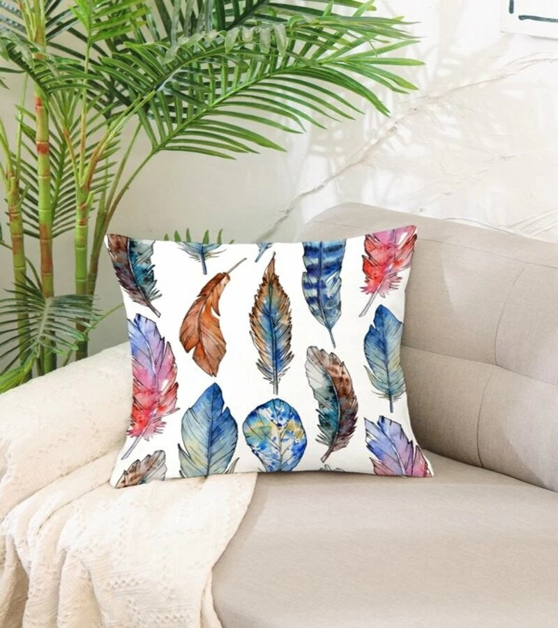 Cojín estampado pluma